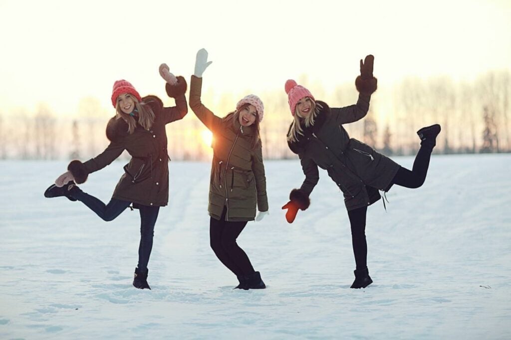 3 women in the snow