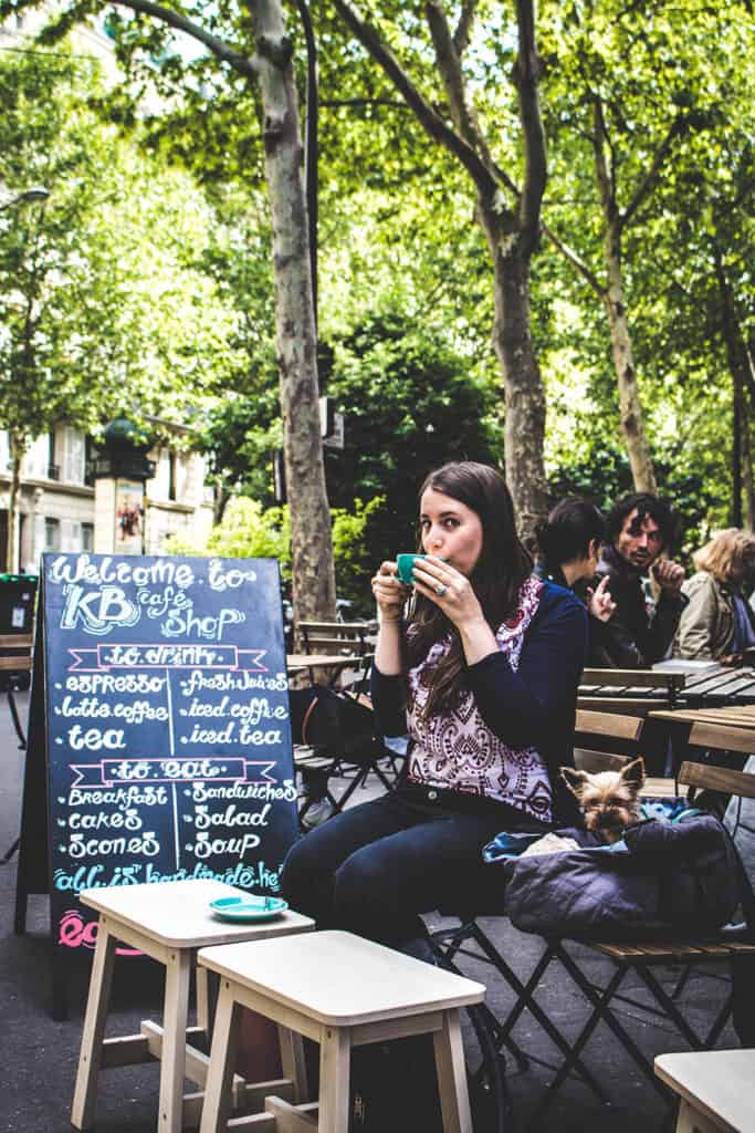 Alix having coffee in Paris
