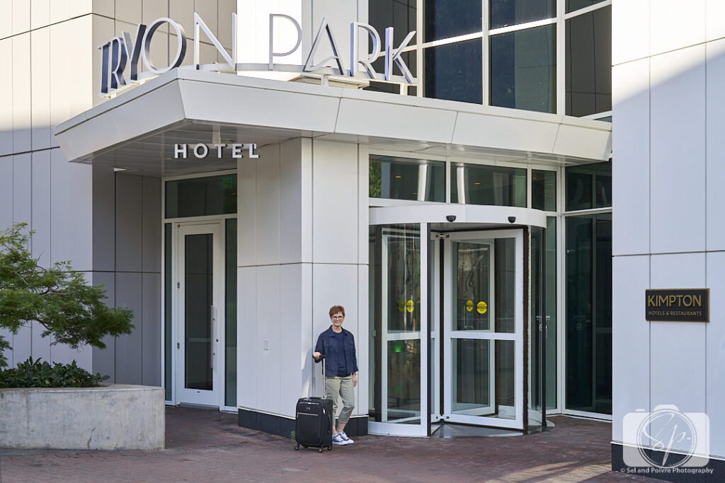 Andi at the Kimpton Tryon Park Hotel with her Level8 Capture Carry-on
