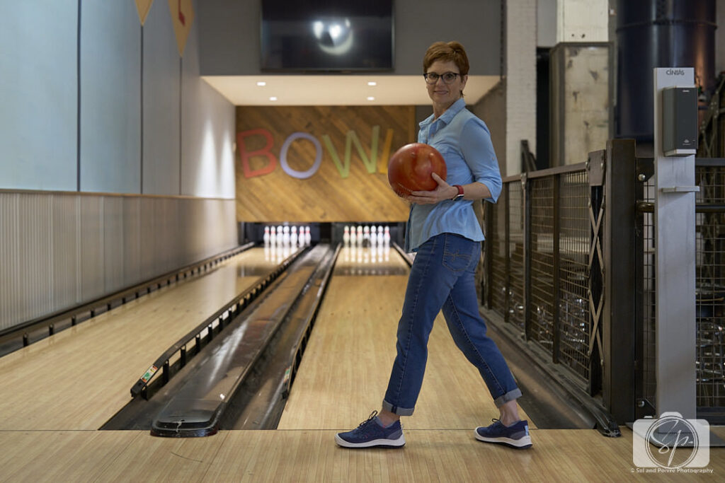 Andi Bowling at the Kimpton Cardinal hotel with Jambu Sunny plant-based shoes