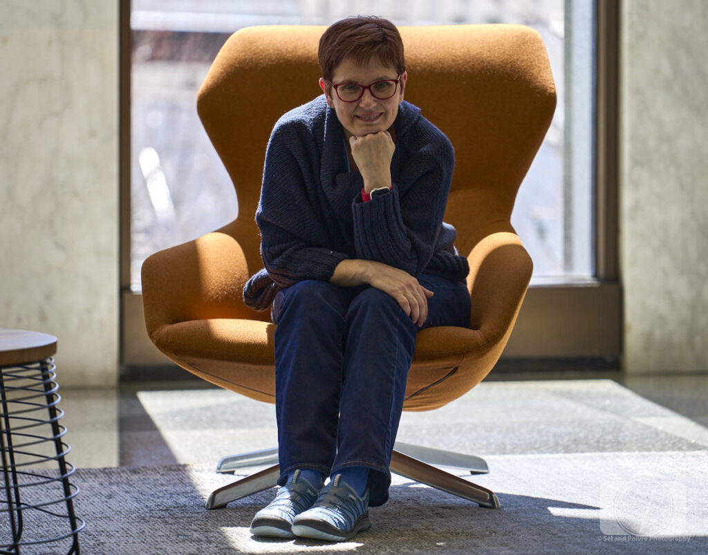 Andi in her Jambu Maple Eco-Vegan inside Aon Center in Chicago