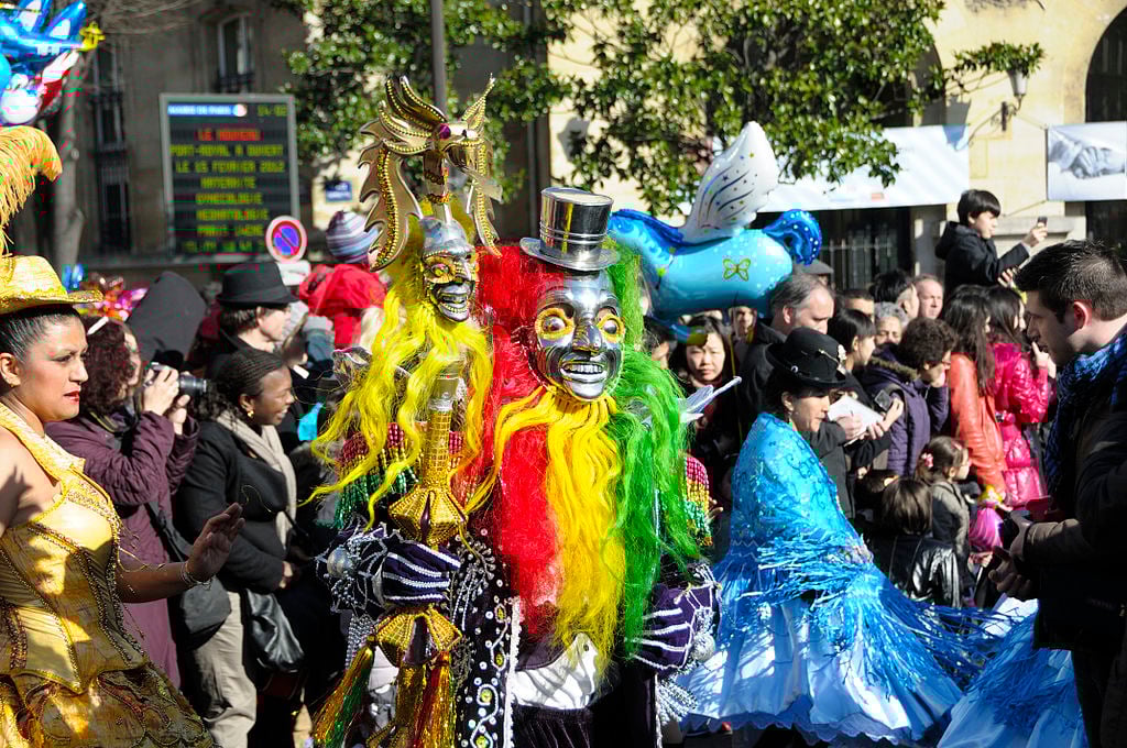 photo of carnaval attendees in costume in Paris