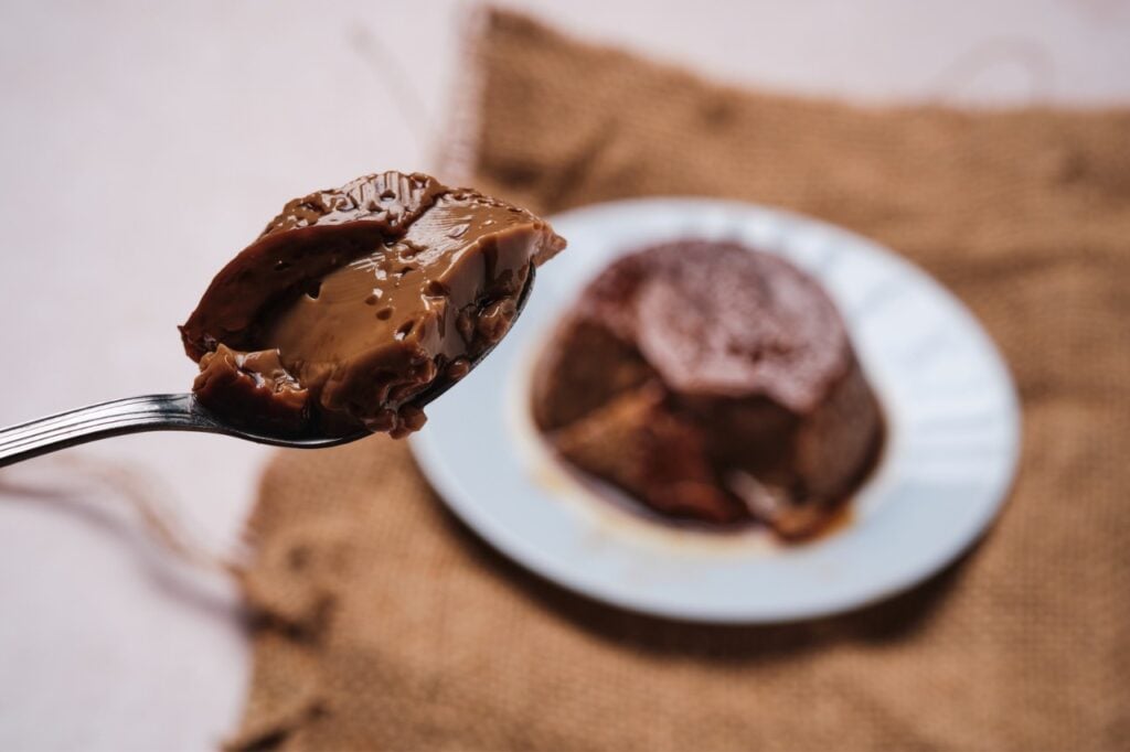 Close-up of a spoonful of delicious coffee flan
