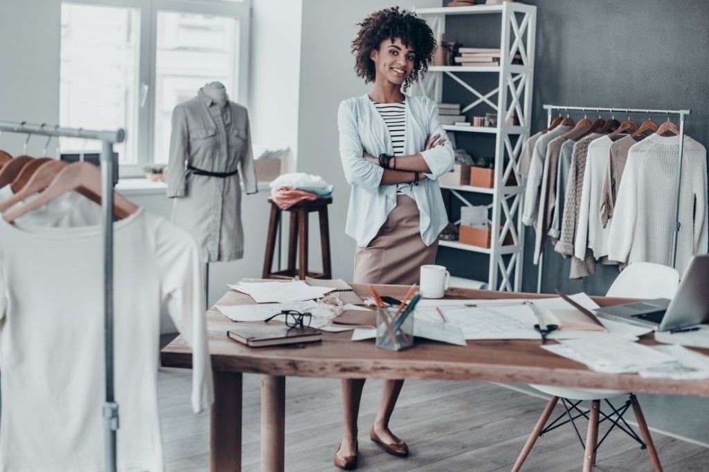 women standing in an office working in fashion
