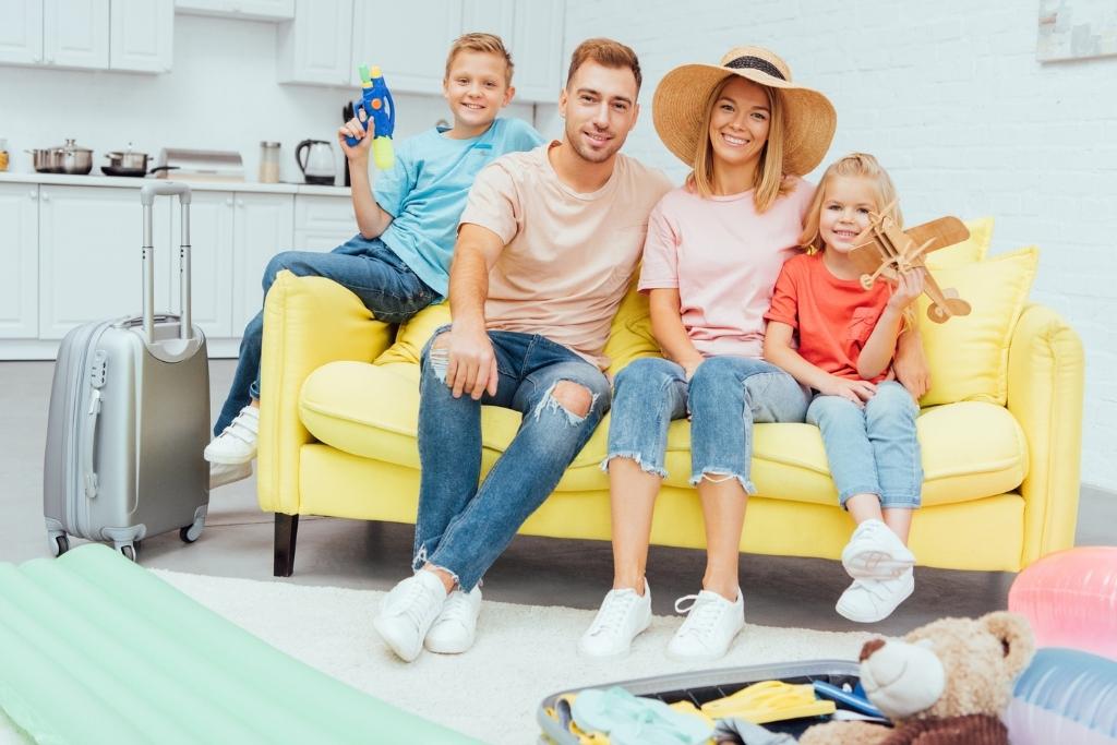 family sitting on couch
