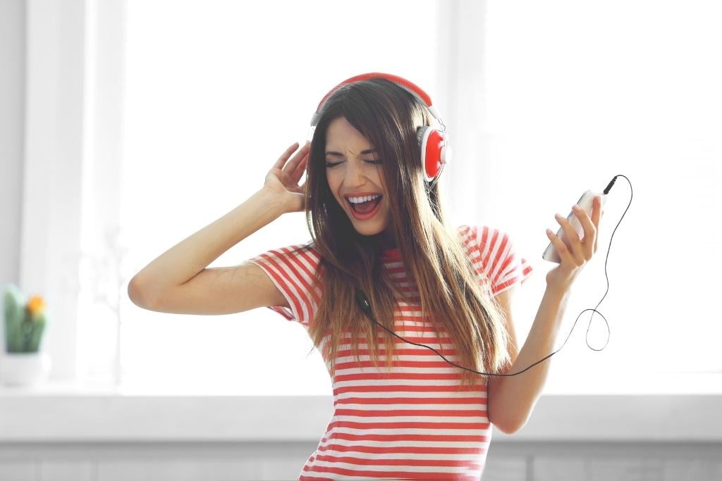 girl in red and white striped shirt