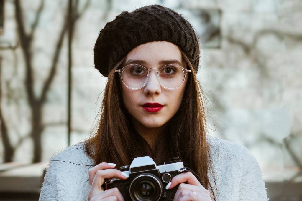 french girl with beret and camera