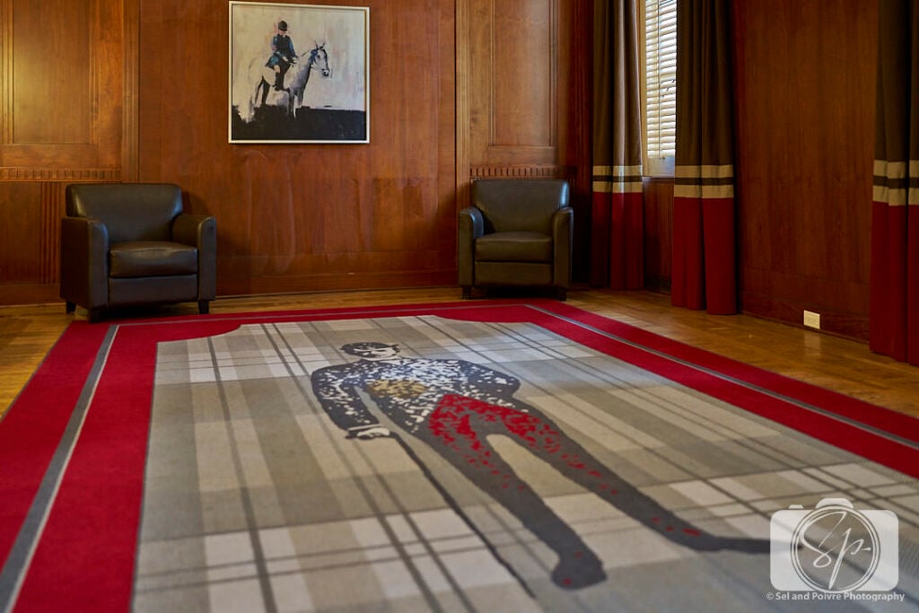 RJ Reynolds motif in the carpet of the Boardroom in the Kimpton Cardinal hotel