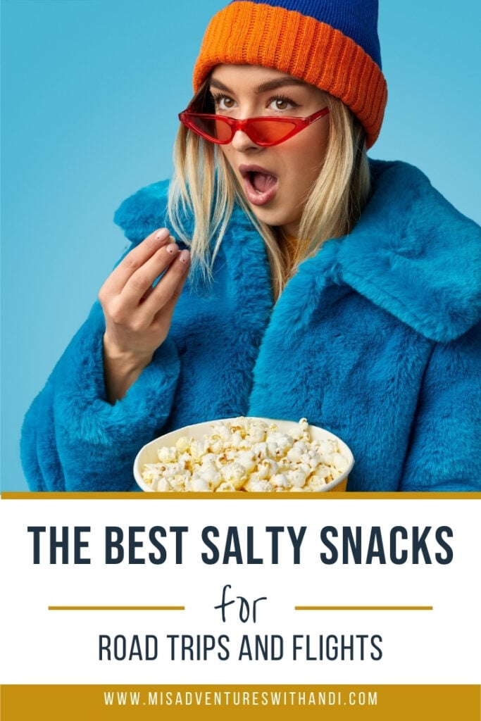girl in sunglasses holding popcorn