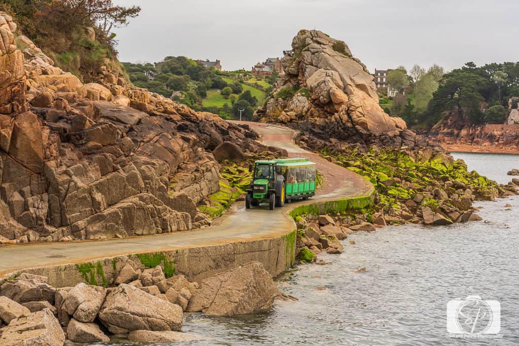 Tractor moving people on the Ile de Brehat Brittany France