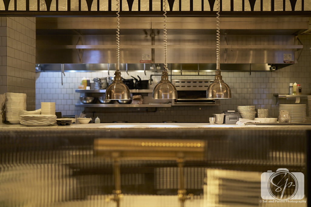 View of the kitchen Inside the Katherine Brasserie in the Kimpton Cardinal Hotel