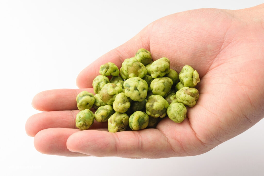 wasabi peas in a hand