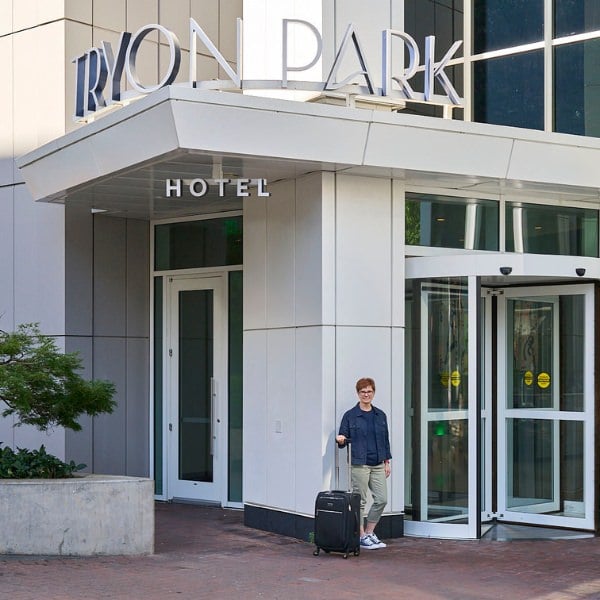 women in front of Kimpton Tryon Park Hotel